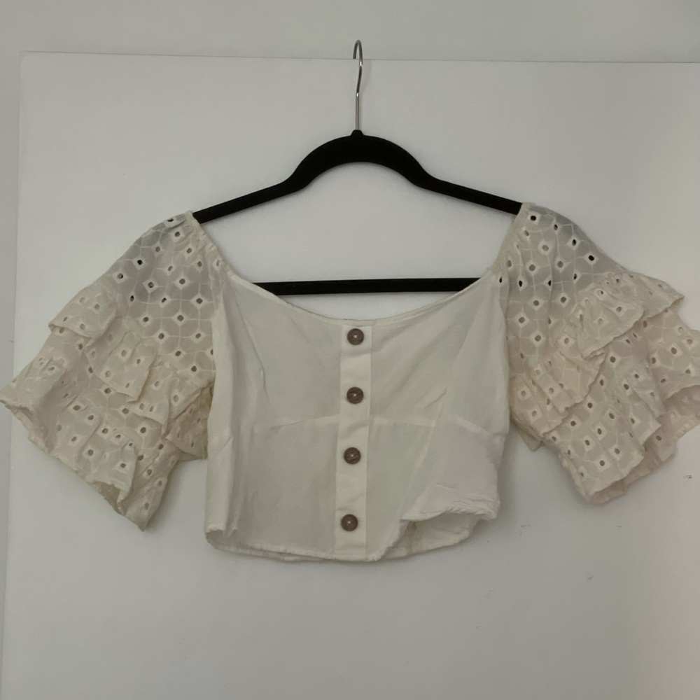Off the shoulder fun sleeve cream button top